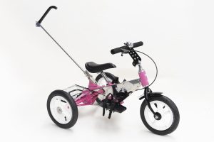 The Tomcat Tiger trike in pink with carer control handle.