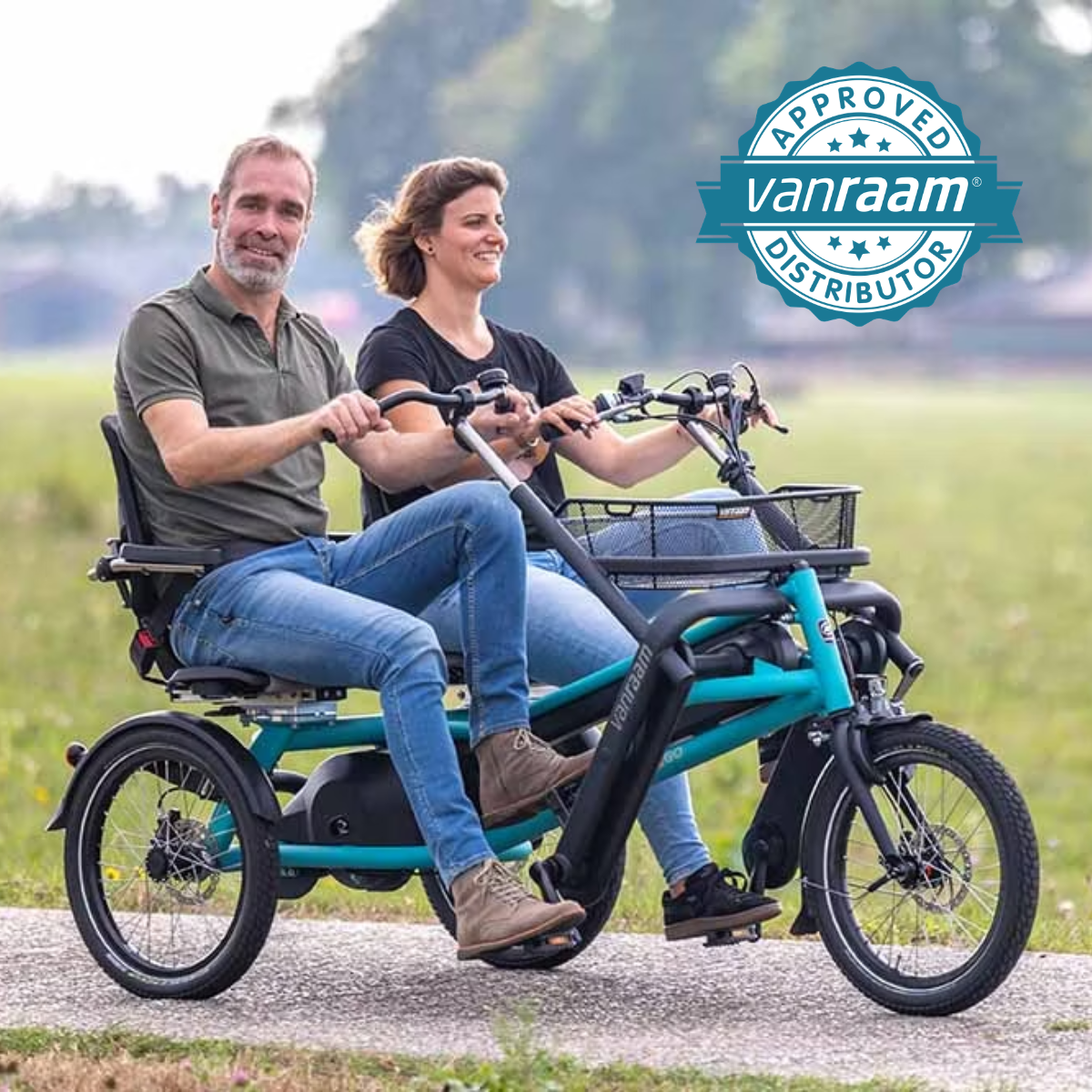 two people riding the VanRaam Fun2Go with the offical dealer logo