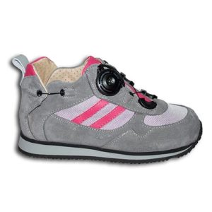 A small grey and pink shoe with a cream-coloured lining and a small device on the front, and joins in the heels, to lace it up.