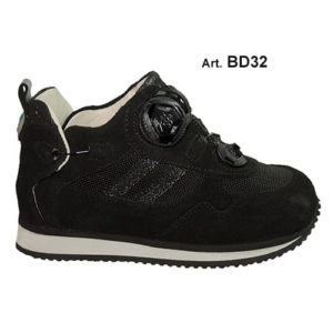 A black shoe with a cream-coloured lining and a small device on the front, and joins in the heels, to lace it up.