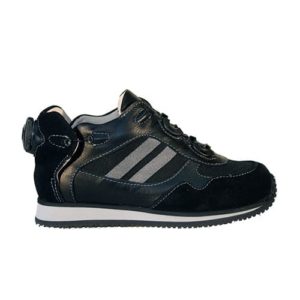 A small black shoe with a cream-coloured lining and a small device on the back to lace it up.