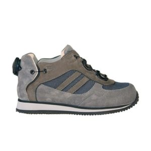 A small brown shoe with a cream-coloured lining and a small device on the back to lace it up.