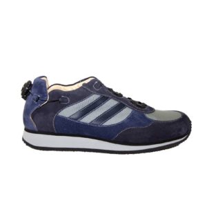 A blue and white shoe with a cream-coloured lining and a small device on the back to lace it up.