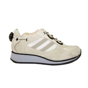 A cream shoe with a cream-coloured lining and a small device on the back to lace it up.