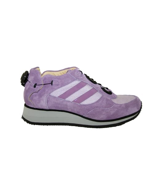 A purple shoe with a cream-coloured lining and a small device on the back to lace it up.