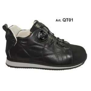 A black shoe with a cream-coloured lining and a small device on the front, and joins in the heels, to lace it up.