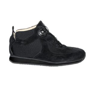 A black shoe with a cream-coloured lining and a small device on the front, and joins in the heels, to lace it up.